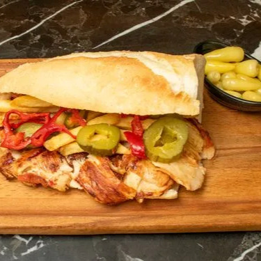 Yarım Ekmek Arası Tavuk Döner +coca cola
