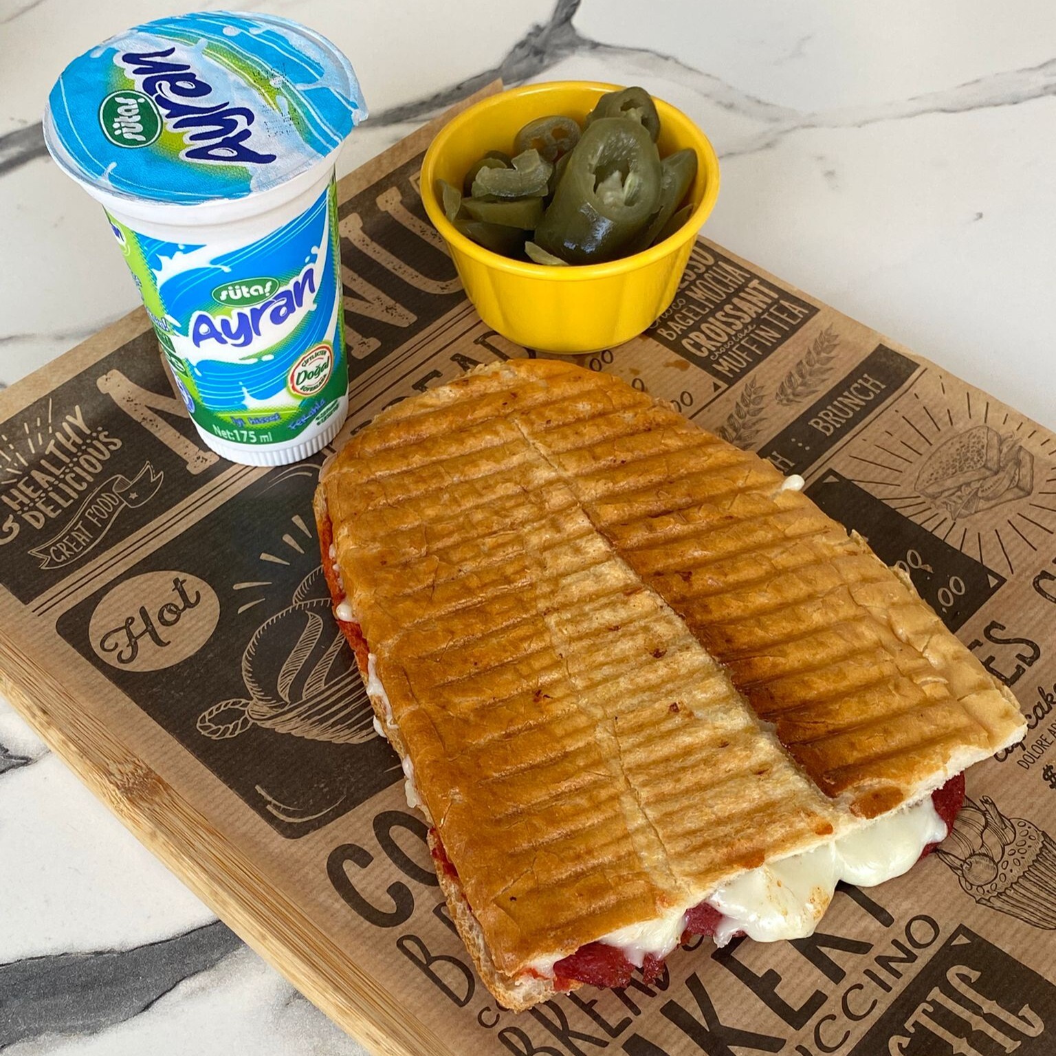 Karışık Tost Yarım Ekmek +1 adet Küçük Ayran
