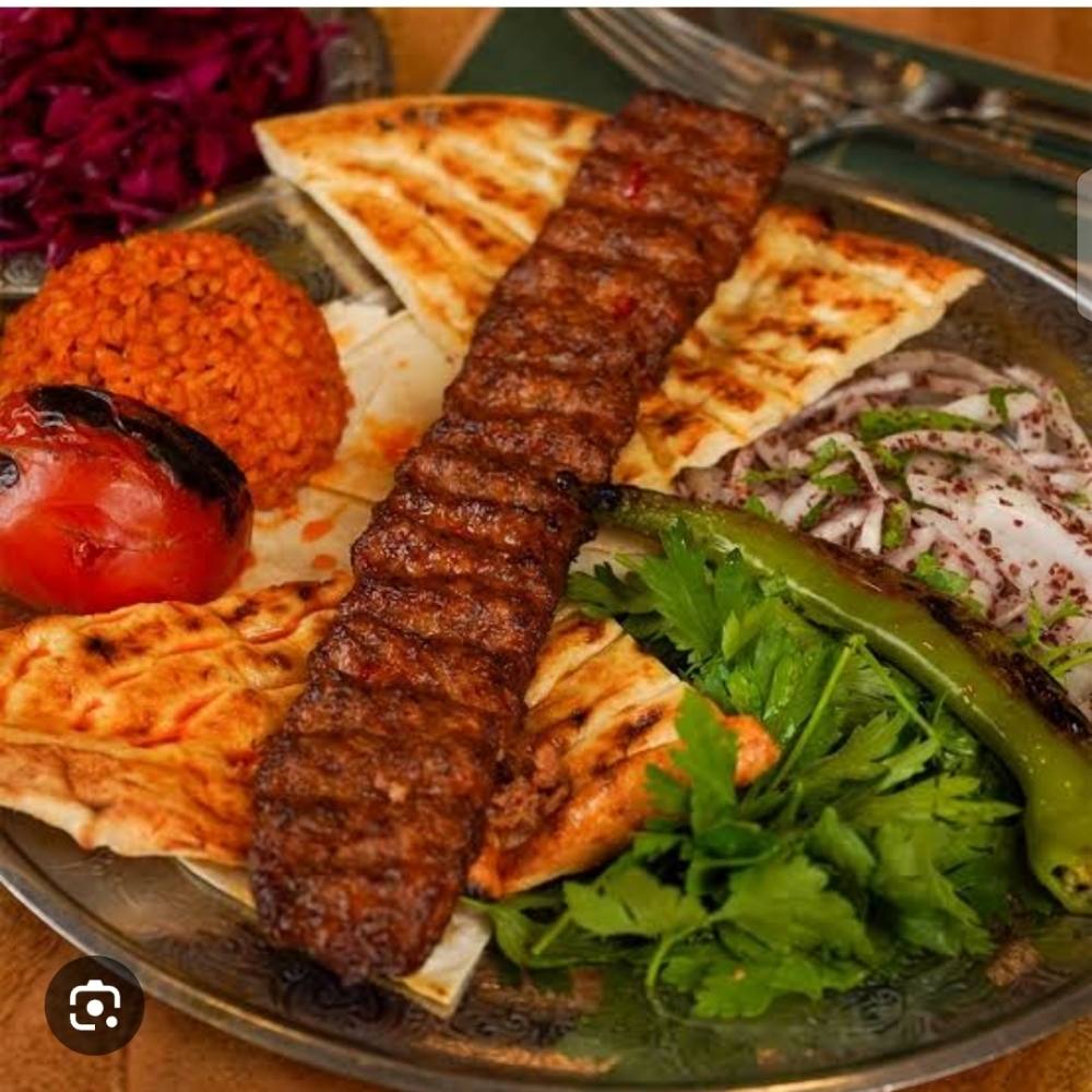 1 Porsiyon Adana Kebap 330 Pepsi Yanında Pişmiş Domates Pişmiş Biber Salata Sumaklı Soğan