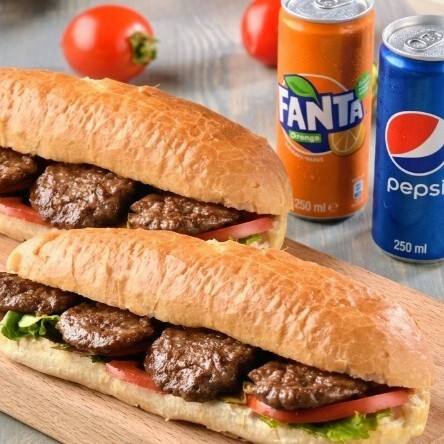 Dev İkili Köfte Şöleni (2 Adet Tam Köfte Tost + 2 Kutu Fanta + Duble Turşu & Sos)