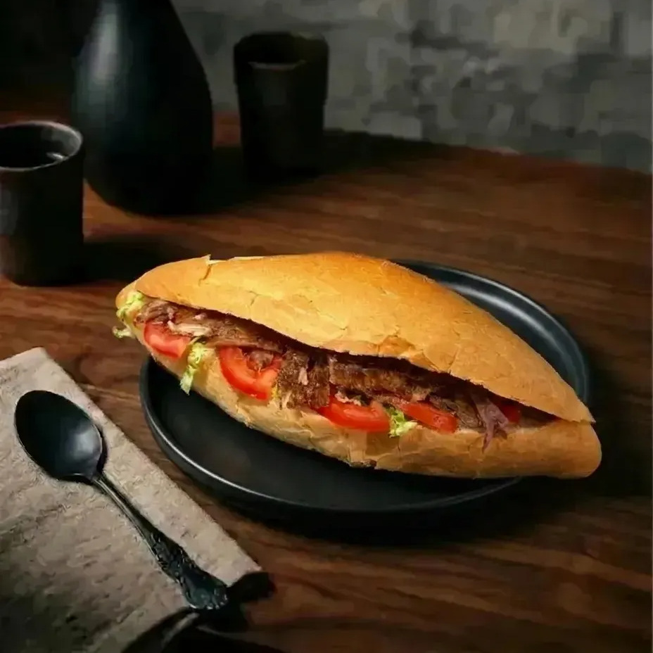 Taş Fırın Ekmek Arası Yaprak Et Döner + 330 ml Coca-cola