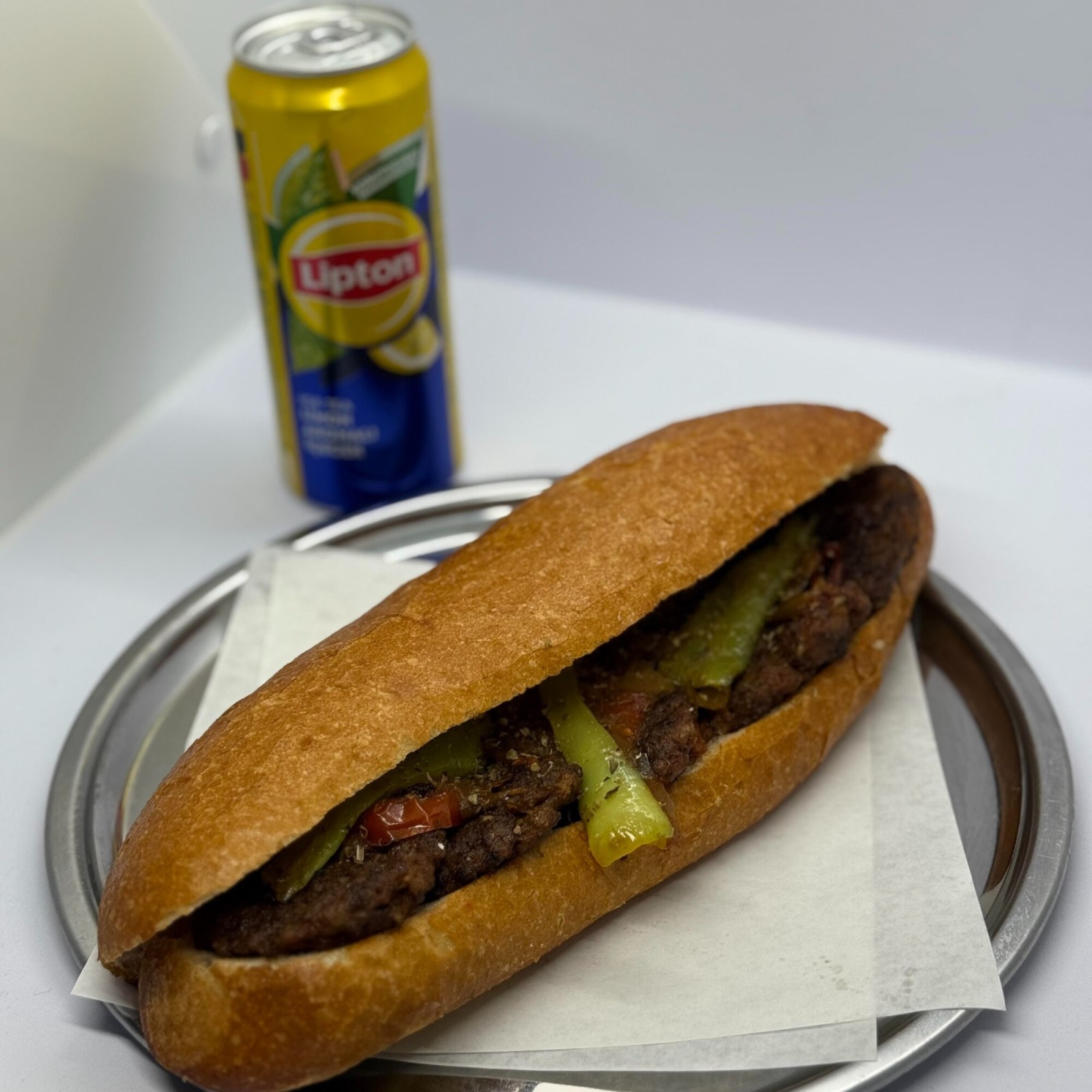 Ekmek Arası Köfte + Ice Tea (330 ml)
