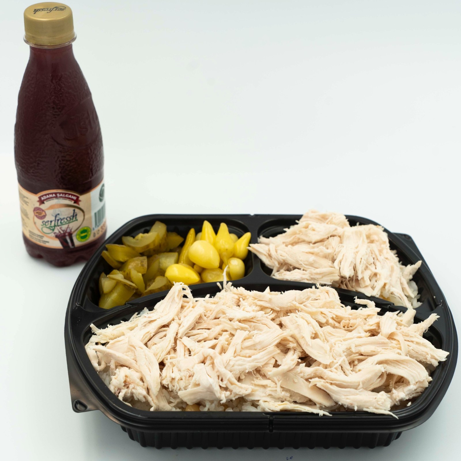 1.5 Porsiyon Tavuklu Nohutlu Pilav + Garnitürler İle + 300 ml Şalgam