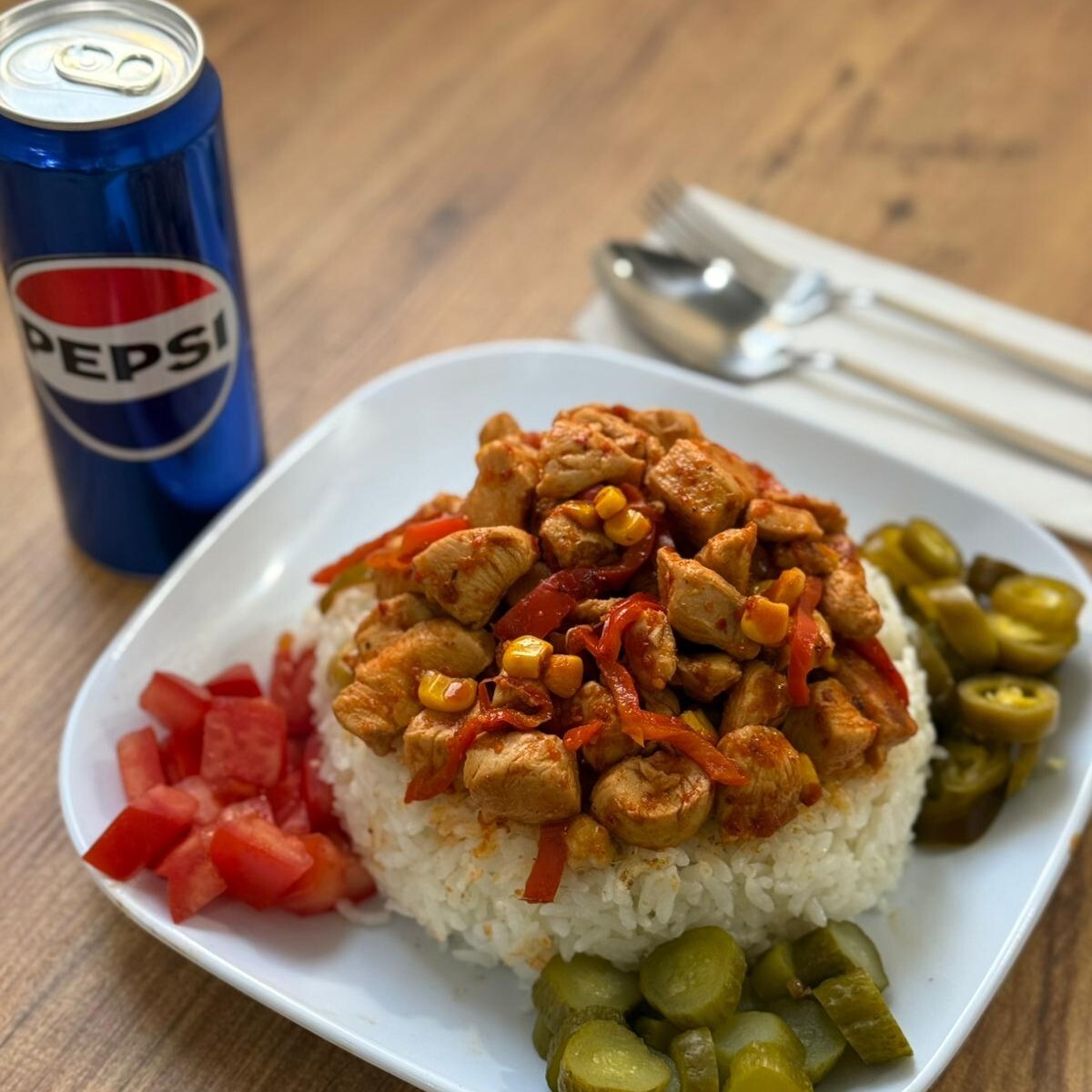Acılı Sote Tavuk Pilav Buçuk + Pepsi(330ml)