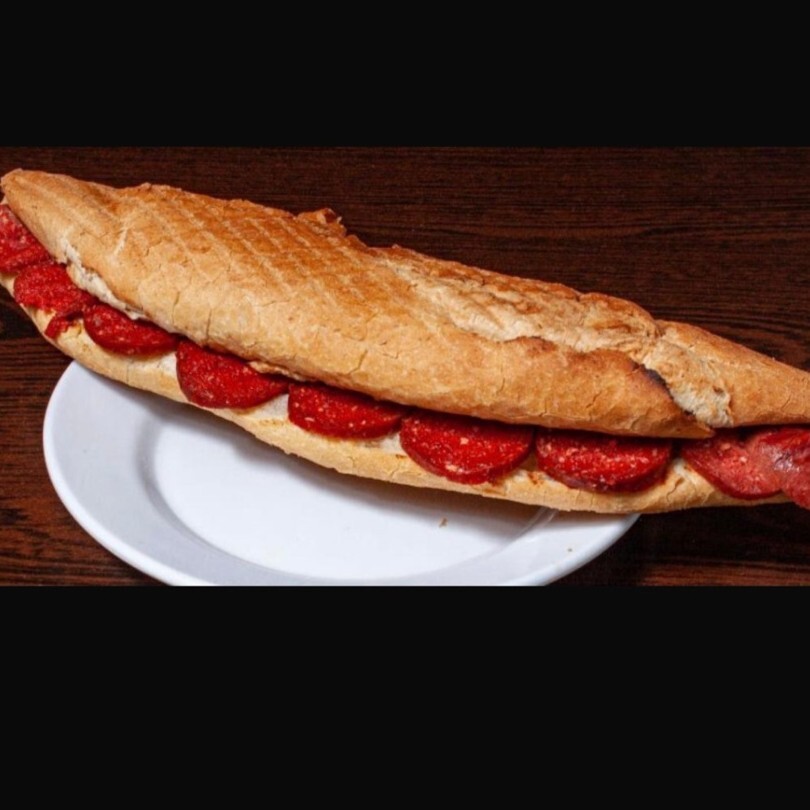 Doyuran Tost Üç Çeyrek Ekmek Arasına Bir Dolu Tost