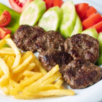 Porsiyon Köfte + Sarıyer-Cola (33 cl.)