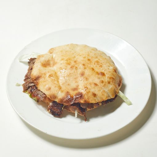 Tombik Ekmek Arası Et Döner + Coca Cola 330 ml