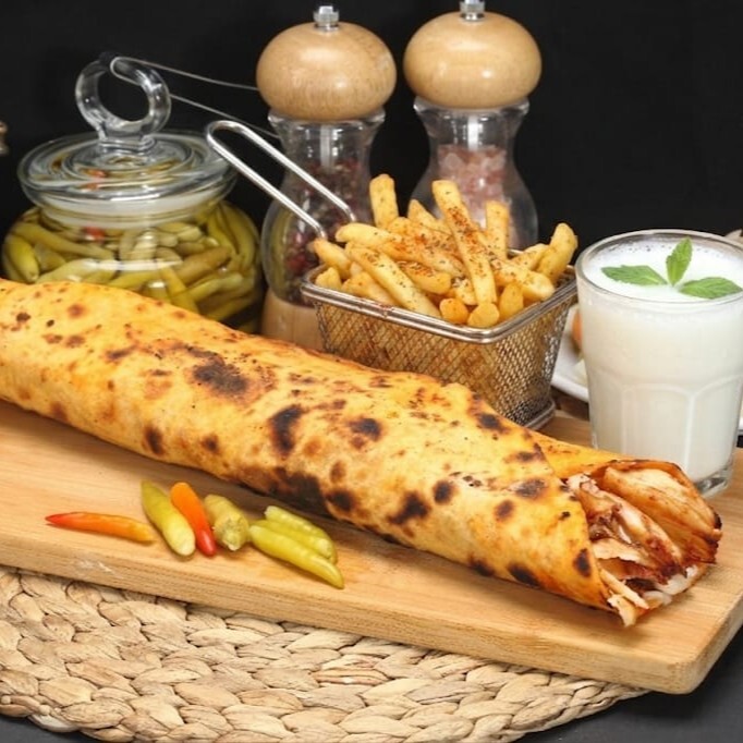 Hatay Usulü Mega (40 cm) Tavuk Döner Dürüm (150 gr) + Patates + Ayran (170 ml)
