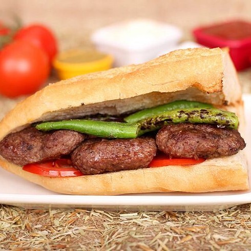 Yarım Ekmek Arası Köfte + coca cola 330 ml